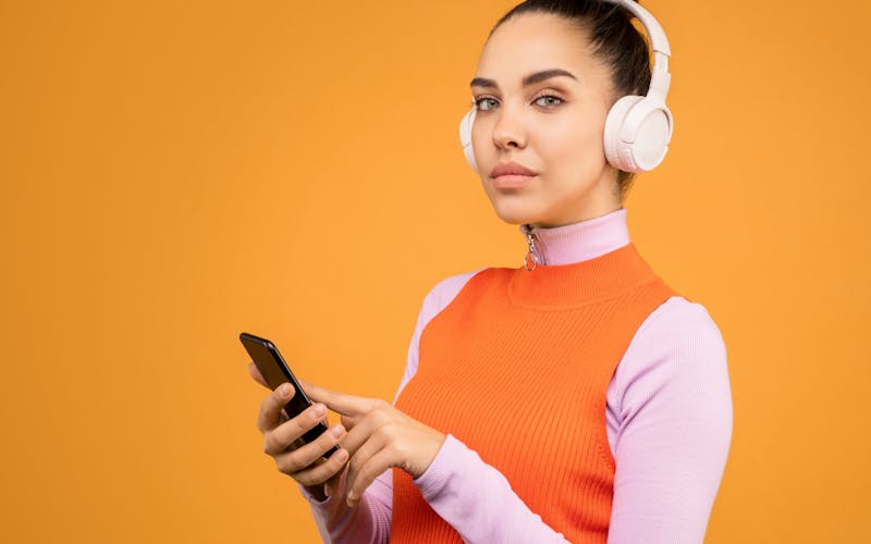 Fan listening to music on phone